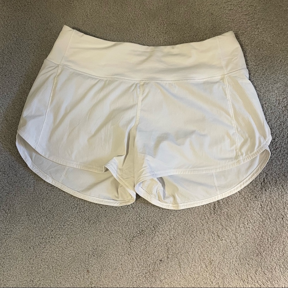 White lululemon speed up shorts